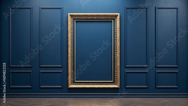 Fototapeta Empty ornate antique picture frame centered on a textured navy blue wall indoors