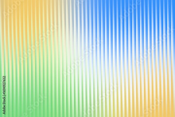 Fototapeta Vibrant abstract background with vertical ribbed texture in a colorful blend of green, yellow, orange, and blue
