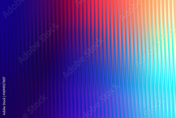 Fototapeta Abstract vertical gradient of vibrant colors, from deep blue to bright red and yellow, with a ribbed texture creating a sense of depth and movement