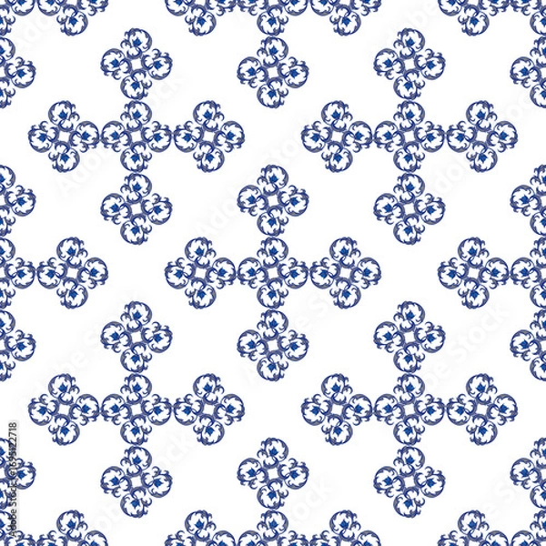 Fototapeta A seamless pattern with intricate blue and white ornamental cross-like and floral shapes, creating a textured, elegant design perfect for décor interior, wallpaper and scrapbooking paper