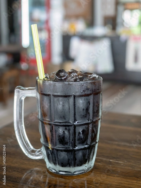 Fototapeta Close up of Thai style ice black coffee ,selective focus