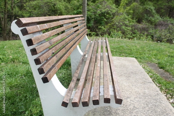 Fototapeta A park bench