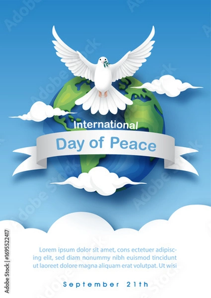 Fototapeta Poster illustration campaign of International Day of Peace with white dove peace flying in paper cut style, wording of event on banner ribbon , example texts on blue sky background