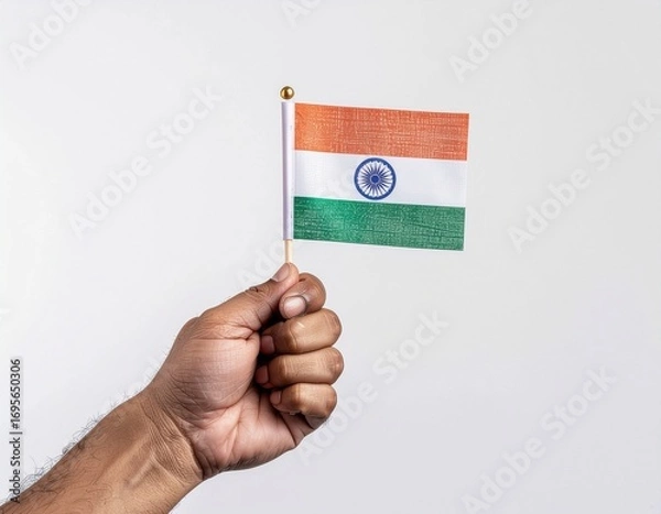 Fototapeta Hand Holding Small Indian Flag on White Background