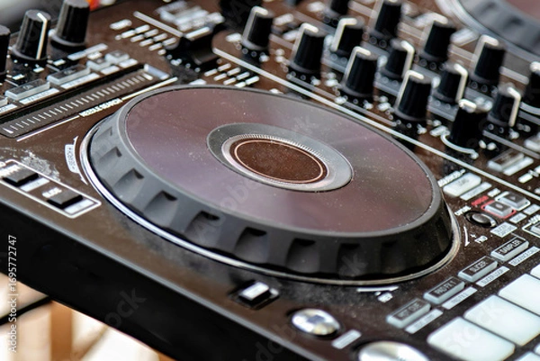 Fototapeta This is an image of a DJ mixing console commonly known as a DJ mixer