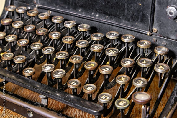 Fototapeta This is an image of a typewriter with its keys in the lowercase letter position