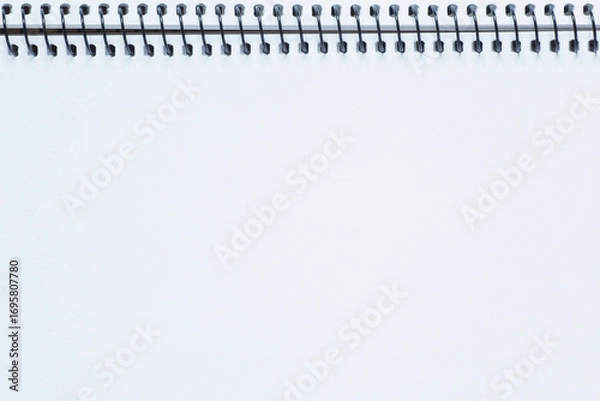 Fototapeta close up of blank white page of sketchbook with spiral binder