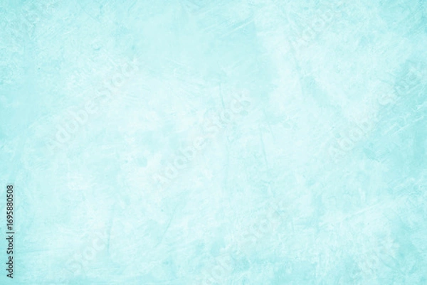 Fototapeta Pastel blue and white concrete stone texture for background in summer wallpaper. Cement and sand wall of tone vintage. Concrete abstract wall of light cyan color, cement texture mint green for design.