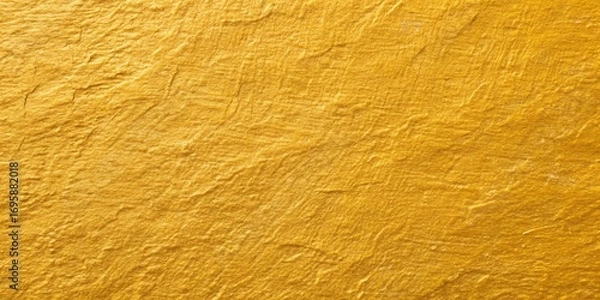 Fototapeta Close up full frame shot of a rich textured golden yellow abstract surface