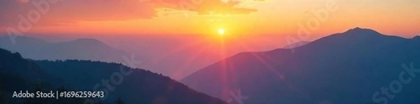 Fototapeta Serene sunrise over a misty mountain range, conveying peace and inner tranquility Perfect for meditation, yoga, or spiritual reflection websites and publications , self-discovery, enlightenment