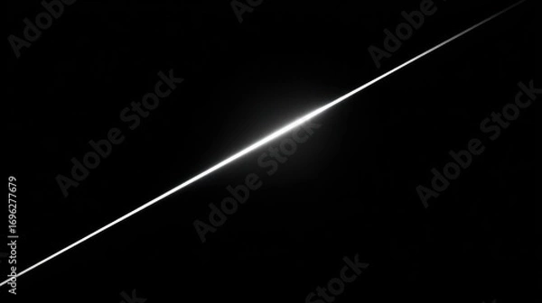 Fototapeta A striking diagonal line with soft glowing edges cuts through a completely black, stark, and minimalist background