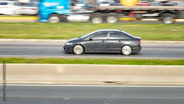 Fototapeta Smooth Ride, Fast Lane: Urban Elegance in Motion