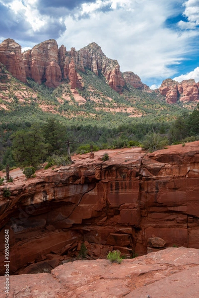 Obraz Dramatic cloudscape and sinkhole at Devil's Kitchen in Arizona