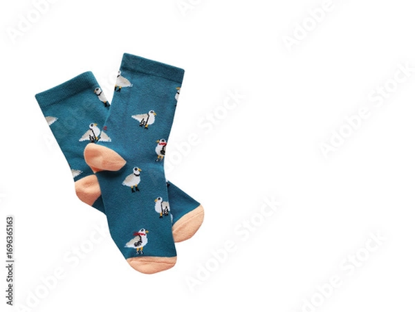 Fototapeta Bright children's multi-colored socks with decorative pattern, top view	