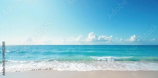Fototapeta Serene ocean meeting the sky at the horizon  Calm waves gently lap the shore under a vast, clear sky  Perfect for travel, nature, and serenity themes ,  majestic,  sea view