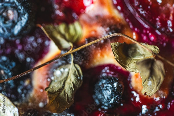 Fototapeta Background with the texture of sweet pie with apricot and figs. Close-up, top view. High quality photo