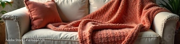 Fototapeta Cozy oversized blanket sweater, perfect for relaxing on the couch Soft, warm, and comfortable for ultimate relaxation Ideal for chilly evenings and lazy weekends , couch, apparel