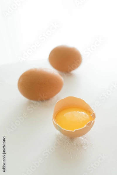 Fototapeta Raw broken eggs 