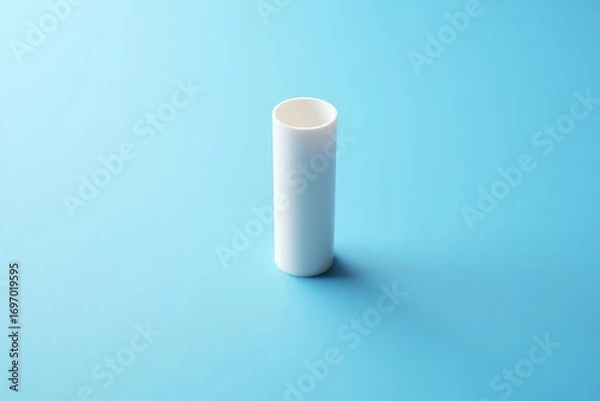 Fototapeta Minimalist Still Life White Cylinder on a Light Blue Background with Soft Shadow