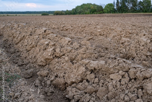 Fototapeta farm concept field work. Soil texture ground view