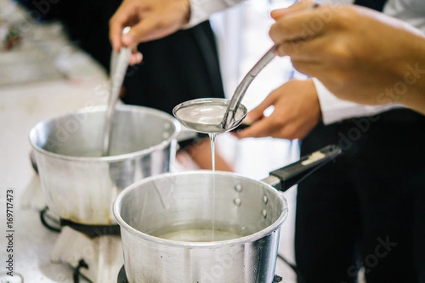 Fototapeta To Make Aroma the Gel CandleCandle. Boiling and pouring a scented candle.