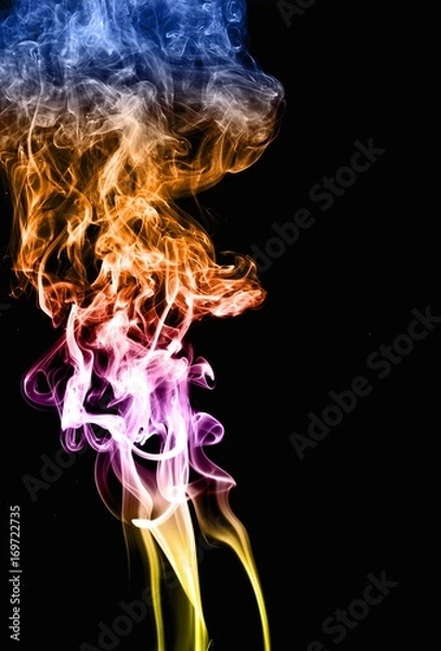 Fototapeta Abstract colorful smoke on black background, smoke background,colorful ink background,Yellow, Violet, Orange, Blue,beautiful color smoke