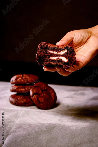 Obraz Hand holding cookie close up