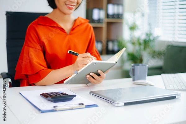Fototapeta Business accountant or financial expert analyze business report graph and finance chart. banking business and stock market research. At office