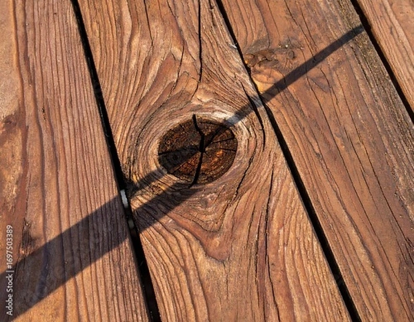 Obraz Wooden decking with a knot