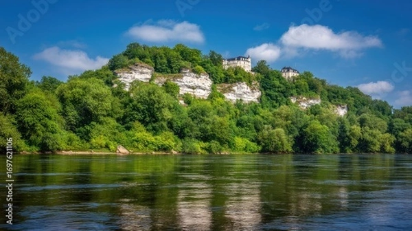 Fototapeta Riverbank with cliffs and castle