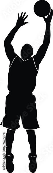 Fototapeta Silhouette of a basketball player shooting, a dynamic action shot of sport