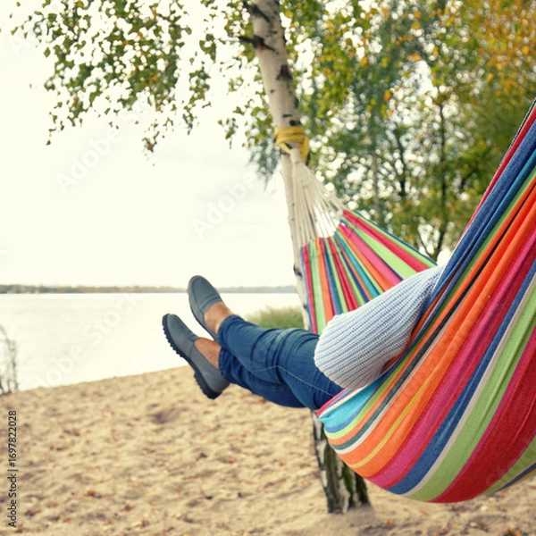 Fototapeta Relaxed in the Hammock: Embracing Autumn Serenity