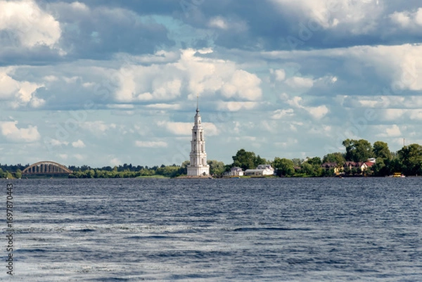 Fototapeta The flooded bell tower of St. Nicholas Cathedral rises above the surface of the Volga River. Kalyazin, Tver region.