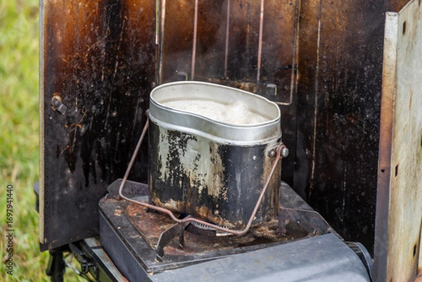 Obraz アウトドアで飯ごう　 campsites using a mess kit