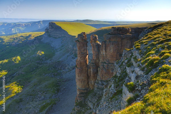 Fototapeta A panoramic aerial view of the Two Monks rock on the Bolshoy Bermamyt plateau, North Caucasus, without people, at daytime, Stavropol Krai, Russia