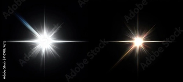 Fototapeta Two radiant light flares against a black background