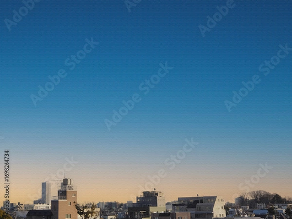 Fototapeta ビル群が染まる東京の夕暮れ空。イラスト風の写真。