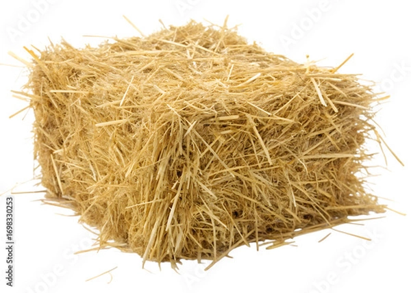 Fototapeta A bale of hay is shown in this image with golden straw for animal bedding or feeding