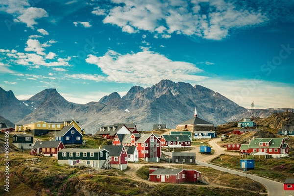 Obraz Small town on east coast of Greenland with colorful houses and mountain background