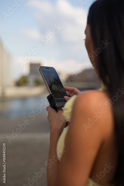 Obraz young woman using laptop on the beach