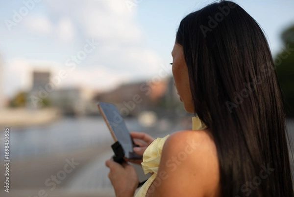 Obraz young woman using tablet computer in cafe