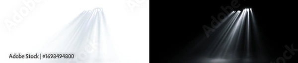 Fototapeta Volumetric white light rays shining down. Cinematic god rays or divine spotlight effect isolated on a transparent background for spiritual or stage design.
