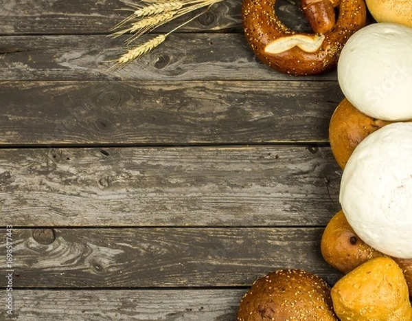 Obraz Assorted breads on weathered wooden planks