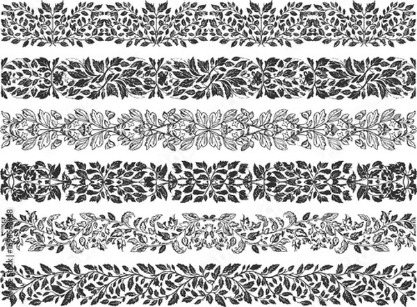 Fototapeta Collection of seven intricate black and white floral and leafy decorative borders and ornate seamless patterns