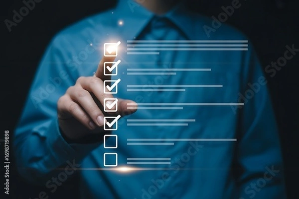 Obraz Man pointing at digital checklist with completed tasks on virtual screen