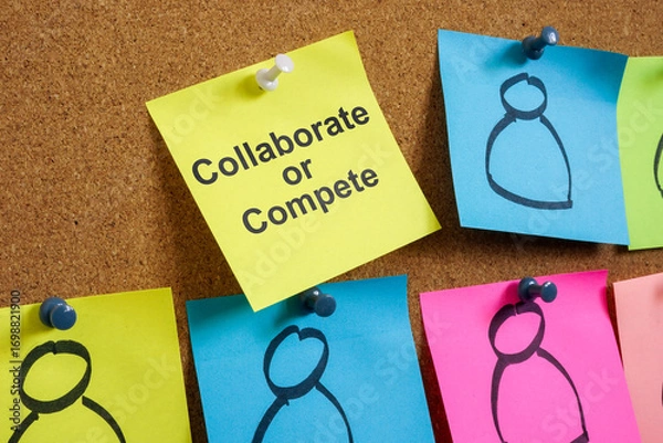 Fototapeta Pinned note with text collaborate or compete. Business rivalry.
