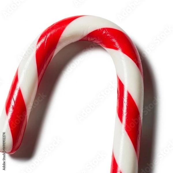 Fototapeta Close Up View of a Red and White Striped Candy Cane on White Surface