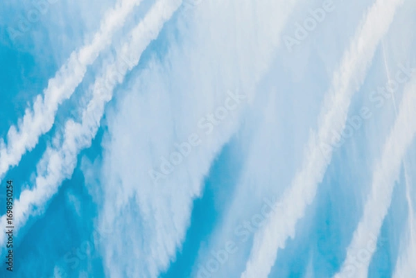 Fototapeta Traces airplane blue sky clouds background abstract lines stripes pattern