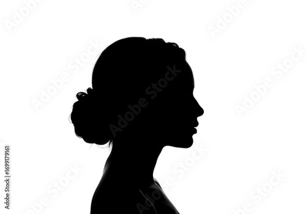 Fototapeta Silhouette of a womans head isolated on white background in profile view