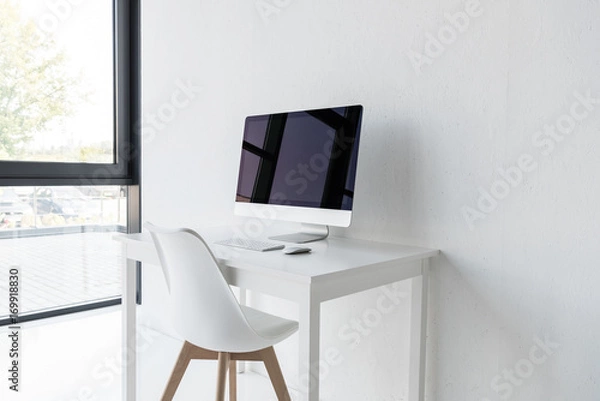 Fototapeta workplace with computer in modern office